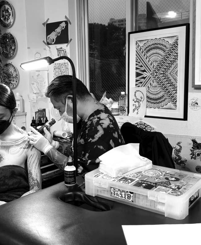 Yas, resident tattoo artist at ZUMBIDO TATTOO in Nakameguro, Tokyo